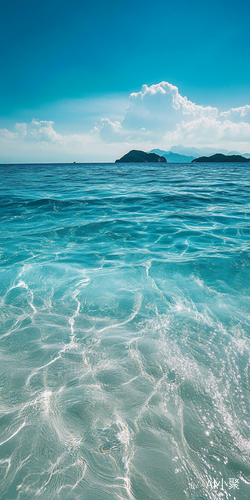 Stunning Coastal Scene with Crystal Clear Water and Distant Islands