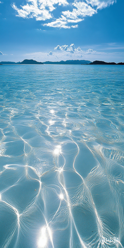 Stunning Coastal Scene with Crystal Clear Water and Distant Islands